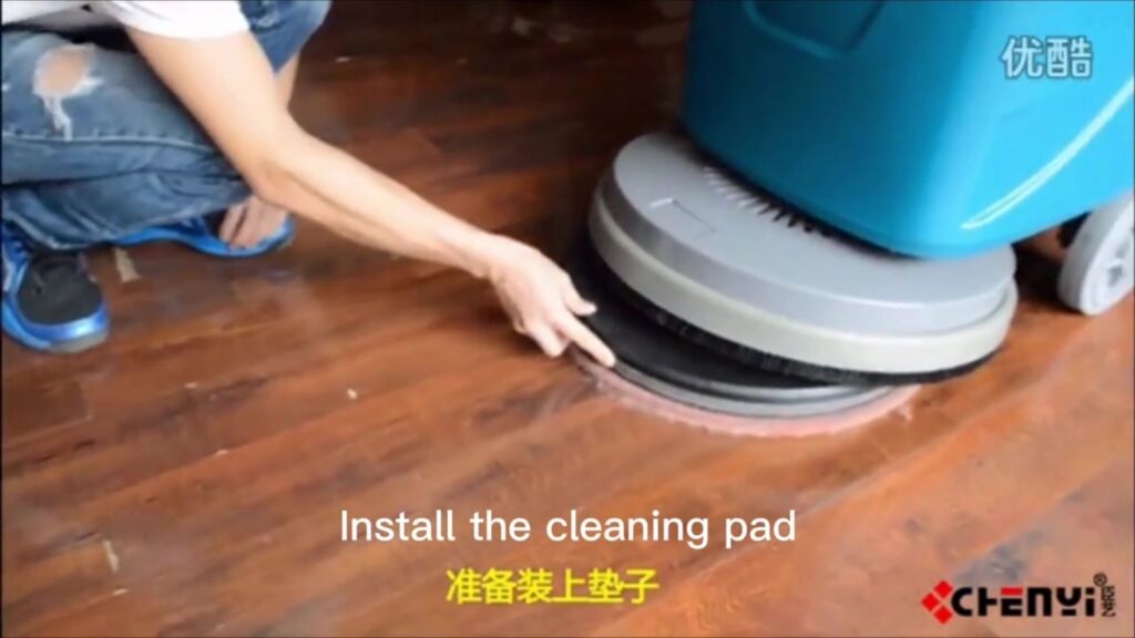 Get the pad holer with pad under the brush tray.